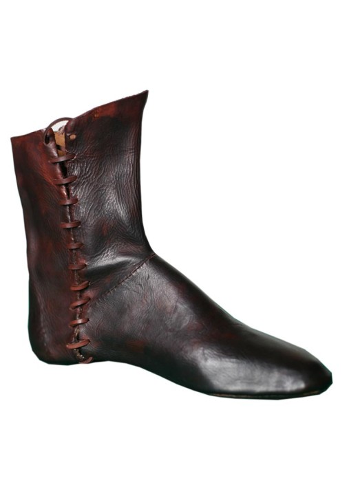 Les bottes médiévales faites à la main en cuir